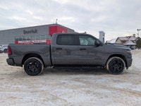 The 2026 Ram 1500 Black Express delivers bold design and confident capability in a full size pickup... (image 7)