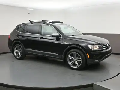 This 2021 Volkswagen Tiguan offers the perfect combination of style, versatility, and confidence on...