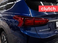 Climate Control, Dual Zone Front Climate Control, Premium Sound System and more! Clutch is the large... (image 9)