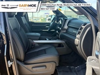The 2026 Ram 1500 Sport is a striking truck in a bold black finish with a powerful 4x4 drivetrain, p... (image 9)