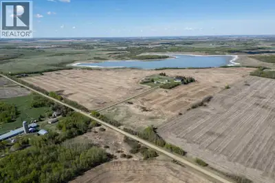124.53 Acres - Barely a mile off pavement and only 20 minutes to Leduc - 100+/- acres in Canola/Whea...