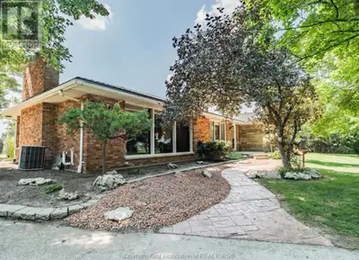 Discover the charm of country living in this spacious 2,200 sq. ft. brick rancher, set on a serene a...