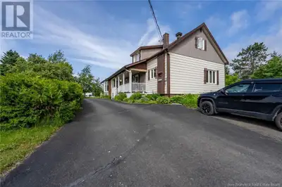 Income potential! Welcome to 6 Rue Tardif St-Leonard NB, a spacious and versatile home with so much...