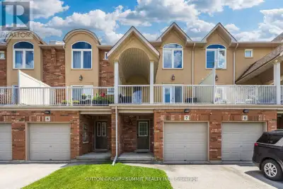 A RARE OPPORTUNITY TO OWN A BEAUTIFULLY UPDATED MIXED-USE TOWNHOME IN BURLINGTON'S SOUGHT AFTER TANS...