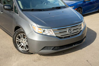 This 2013 Honda Odyssey EX combines practicality, comfort, and family-friendly versatility in a mini... (image 5)
