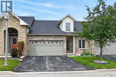 Gorgeous in Garth Trails! This spacious bungaloft features a double garage and is just steps from th...