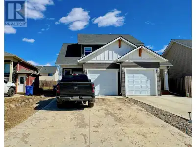 * PREC - Personal Real Estate Corporation. Modern half duplex on a quiet, no-through street & close...