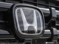 Introducing the 2026 Honda Ridgeline Black Edition AWD, a stunning red truck designed for those who... (image 7)