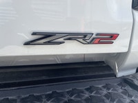 AMVIC Licensed Dealer The 2025 Chevrolet Colorado ZR2 in Summit White is a highly capable and visual... (image 6)