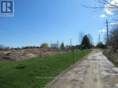 Discover the perfect canvas for your next project with this expansive 7-acre lot located at 1525 Sna...