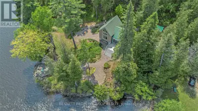 Idyllic Post and Beam Waterfront Cottage on the Ottawa River - a fairytale-like property nestled on...