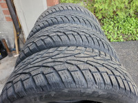 4 UNIROYAL TIGER PAW ICE AND SNOW 3 205 65 R16 WINTER TIRES SET