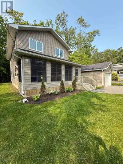 NEW PRICE!! Built in 2010 this 4 season home/cottage is just steps from Sturgeon Lake and has its ow...
