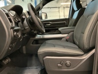 The 2026 Ram 1500 Big Horn, presented in a commanding Black finish and equipped with a robust 4x4 dr... (image 9)
