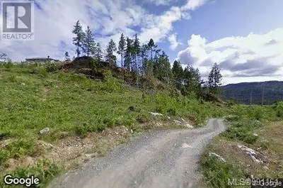 5 Acres of Prime Land – Development Potential Near Shawnigan Lake A stunning 5-acre parcel with endl...