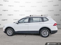 This Volkswagen Tiguan boasts a Intercooled Turbo Regular Unleaded I-4 2.0 L/121 engine powering thi... (image 1)