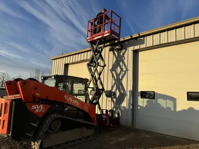 Work safely and be more productive with a scissor lift and your skid steer. Work on uneven terrain a...