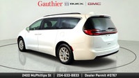 The 2022 Chrysler Pacifica Touring L is a family-friendly minivan that offers a comfortable ride, a... (image 3)