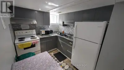 Bright & Spacious Lower-Level Room for Rent in a Prime North York Location! Features a Large Window...