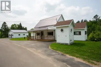 Step into this adorable home that feels like a cozy dollhouse, nestled in a peaceful country setting...