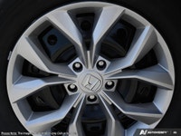 Introducing the 2026 Honda CR-V LX, a stunning black SUV that combines the sophistication of a moder... (image 5)