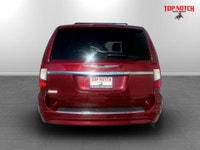 A spacious family minivan with comfortable seating, convenient features, and versatile cargo space,... (image 4)
