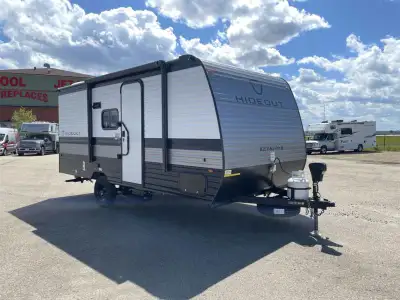 Keystone Hideout Mini travel trailer 161BH highlights: Olympic RV Queen Bed Full Bath Pass-Through S...