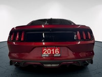 The 2016 Ford Mustang GT in vibrant red with a rear-wheel-drive setup promises dynamic handling and... (image 9)