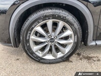 This INFINITI QX50 has a dependable Intercooled Turbo Premium Unleaded I-4 2.0 L/121 engine powering... (image 9)