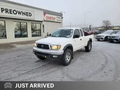 Built to tackle any adventure or workday, this 2004 Toyota Tacoma Extended Cab Pickup combines legen...