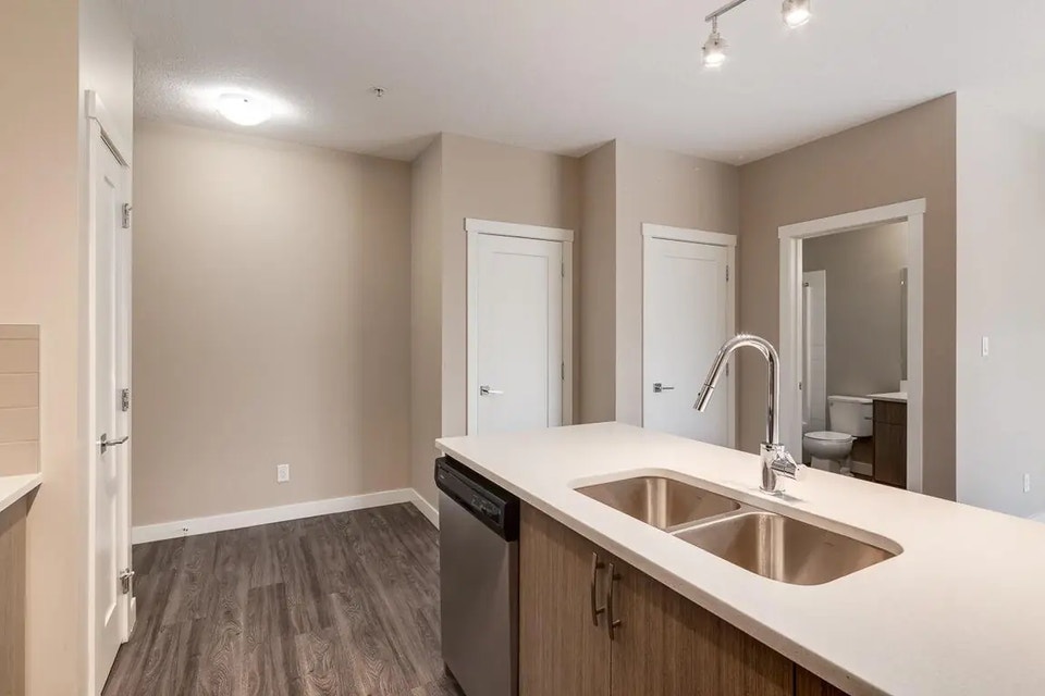 In-suite laundry, stove, oven, fridge, dishwasher, and microwave 5