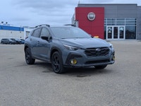 The pre-owned 2024 Subaru Crosstrek Onyx in Blue with a Grey interior delivers rugged versatility, m... (image 8)