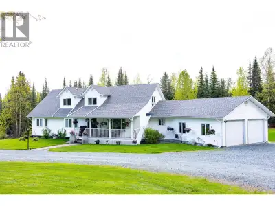 Custom Cape Cod home on nearly 5,000 sq ft of timeless comfort, nestled on pristine, park-like groun...