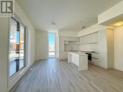 Welcome to this newly built stacked condo townhouse at 15 David Eyer Road #1412 in the highly desira...