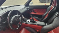 Feel the wind in your hair as you cruise the open road in a Honda S2000. With keyless entry for conv... (image 7)