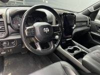 The 2022 Ram 1500 Sport 4x4 Crew Cab in a striking gray exterior is a vehicle crafted for those who... (image 9)