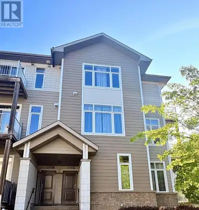 Bright and stylish upper-unit 2-bedroom + den, 3-bathroom end-unit condo townhouse in sought-after A...