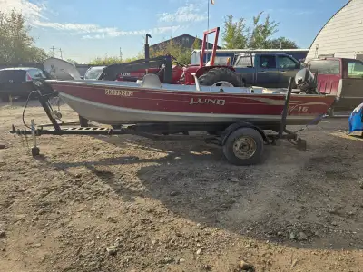2001 16' Lund aluminum boat with 25HP Mercury outboard motor and 1985 trailer, SK plated. Runs good....