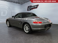 The 2003 Porsche Boxster captures the essence of pure roadster driving, a perfectly balanced mid-eng... (image 6)