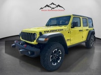 THIS VERY RARE VELOCITY YELLOW WRANGLER RUBICON WITH PLENTY OF OPTIONS INCLUDING 3.6L V6 PENTASTAR E... (image 1)