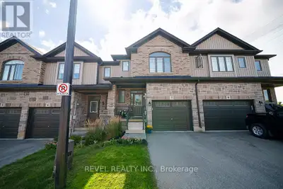 Welcome to 7-1 Tom Brown Drive in the charming town of Paris, Ontario - a beautifully maintained tow...