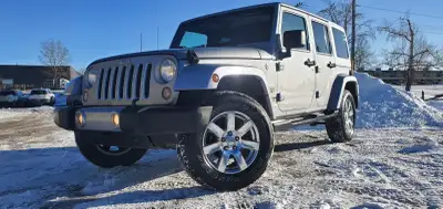 MGI Auto Ltd AMVIC Licenced Dealership STOCK # 31122 2016 Jeep Wrangler Unlimited Sahara - 3.6L V6 4...