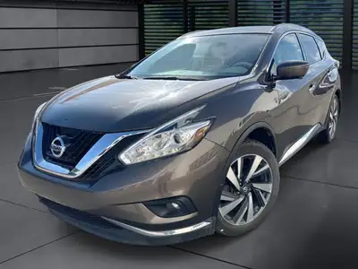 Step into the world of sophistication with this stunning 2016 Nissan Murano, featuring a sleek Gray...