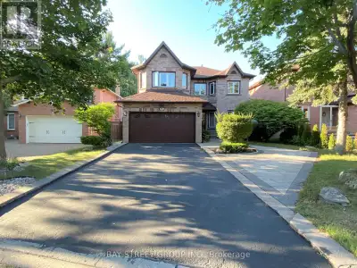 Location! Location! Rare Rental Opportunity! Exceptional 4-Bedroom house with a large deck back to R...