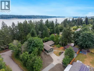 This updated west coast rancher offers exceptional versatility with three independent living spaces...