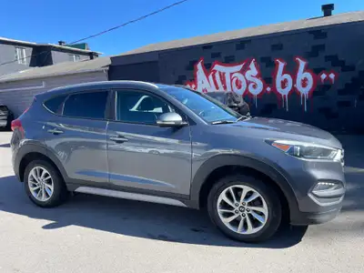 2018 Hyundai Tucson 2.0 L PREMIUM Automatique 197 000 KM . AUCUN ACCIDENT - CARFAX DISPONIBLE . MODÈ...