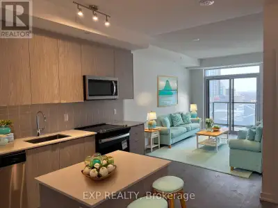 Experience modern urban living in the heart of downtown Kitchener at 55 Duke Street West, Unit #906....