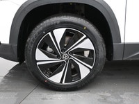 The Volkswagen Taos is a compact SUV that delivers big on style, space, and performance. With a turb... (image 4)