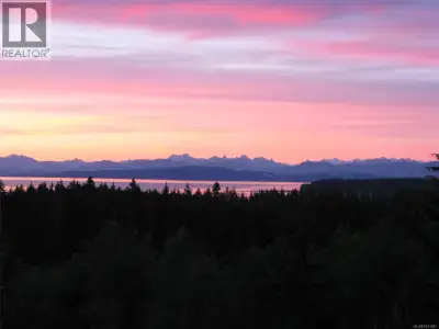 Where Eagles Soar! Upon stepping into this beautiful home on 12 acres, the views of meadows, ocean,...