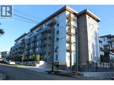 Northwest-facing corner suite with views of Burnaby Mountain and mountains from TWO balconies. Suite...